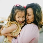 single mom happy with her kid